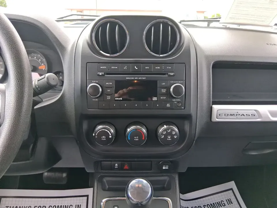 2014 Jeep Compass Sport (1C4NJDBB4ED) with an 2.4L I-4 DOHC engine, Automatic transmission, located at 4508 South Dixie Dr, Moraine, OH, 45439, (937) 908-9800, 39.689976, -84.218452 - **Experience Adventure with the 2014 Jeep Compass Sport at Advantage Car and Credit Xenia!** <br /> <br /> Are you ready to embrace the open road with a vehicle that combines comfort, capability, and style? The 2014 Jeep Compass Sport, available at Advantage Car and Credit in Xenia, Ohio, is the pe - Photo#13