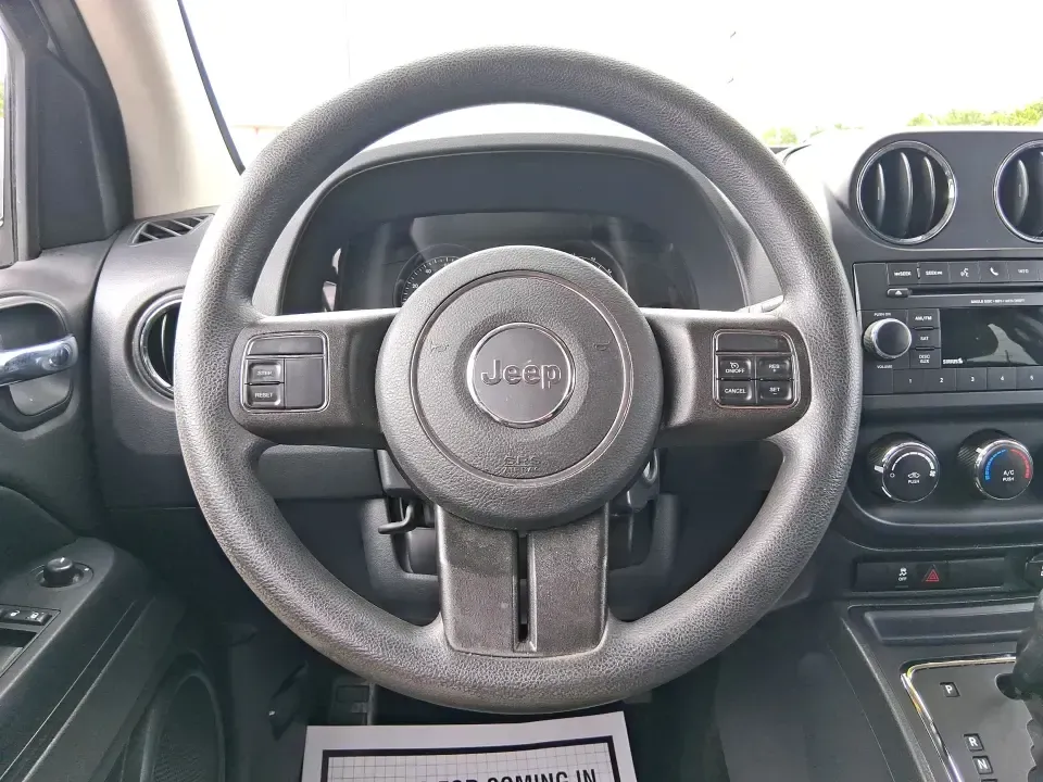 2014 Jeep Compass Sport (1C4NJDBB4ED) with an 2.4L I-4 DOHC engine, Automatic transmission, located at 4508 South Dixie Dr, Moraine, OH, 45439, (937) 908-9800, 39.689976, -84.218452 - **Experience Adventure with the 2014 Jeep Compass Sport at Advantage Car and Credit Xenia!** <br /> <br /> Are you ready to embrace the open road with a vehicle that combines comfort, capability, and style? The 2014 Jeep Compass Sport, available at Advantage Car and Credit in Xenia, Ohio, is the pe - Photo#16
