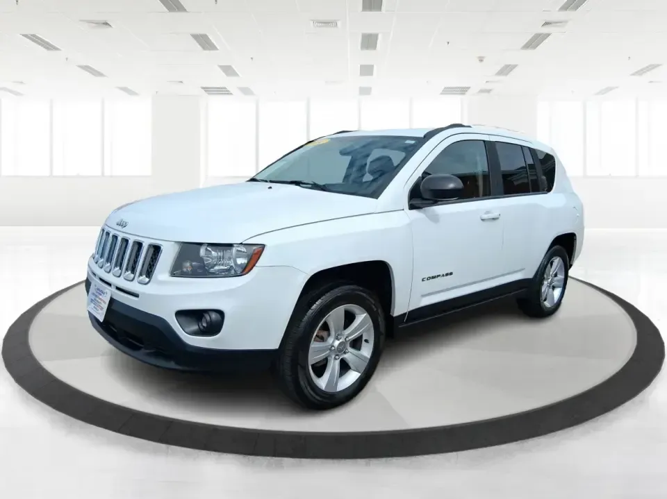 2014 Jeep Compass Sport (1C4NJDBB4ED) with an 2.4L I-4 DOHC engine, Automatic transmission, located at 1230 East Main St, Xenia, OH, 45385, (937) 908-9800, 39.688026, -83.910172 - **Experience Adventure with the 2014 Jeep Compass Sport at Advantage Car and Credit Xenia!** <br /> <br /> Are you ready to embrace the open road with a vehicle that combines comfort, capability, and style? The 2014 Jeep Compass Sport, available at Advantage Car and Credit in Xenia, Ohio, is the pe - Photo#8
