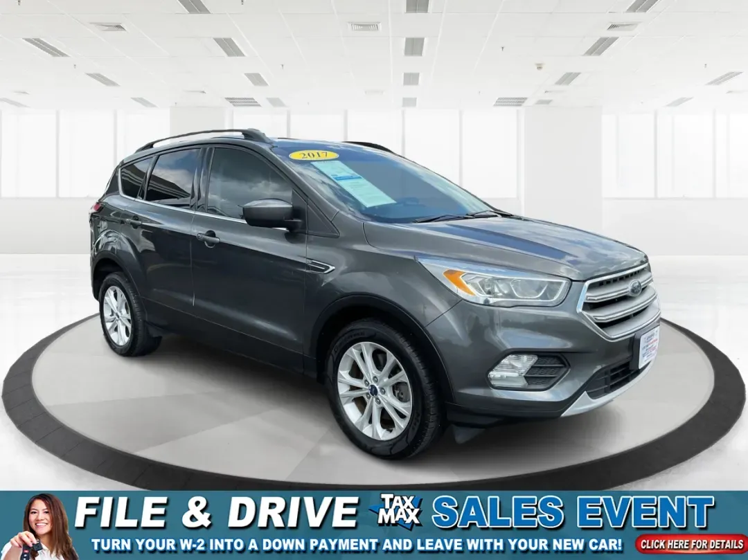 2017 Ford Escape SE (1FMCU9GD7HU) with an Other engine, located at 4508 South Dixie Dr, Moraine, OH, 45439, (937) 908-9800, 39.689976, -84.218452 - **Adventure Awaits With This 2017 Ford Escape SE! Perfect for Your Next Journey!**<br /> <br /> Are you ready to elevate your weekend getaways or daily commutes? The 2017 Ford Escape SE is the ideal SUV for those who crave versatility without sacrificing style. With a spacious interior, advanced saf - Photo#0