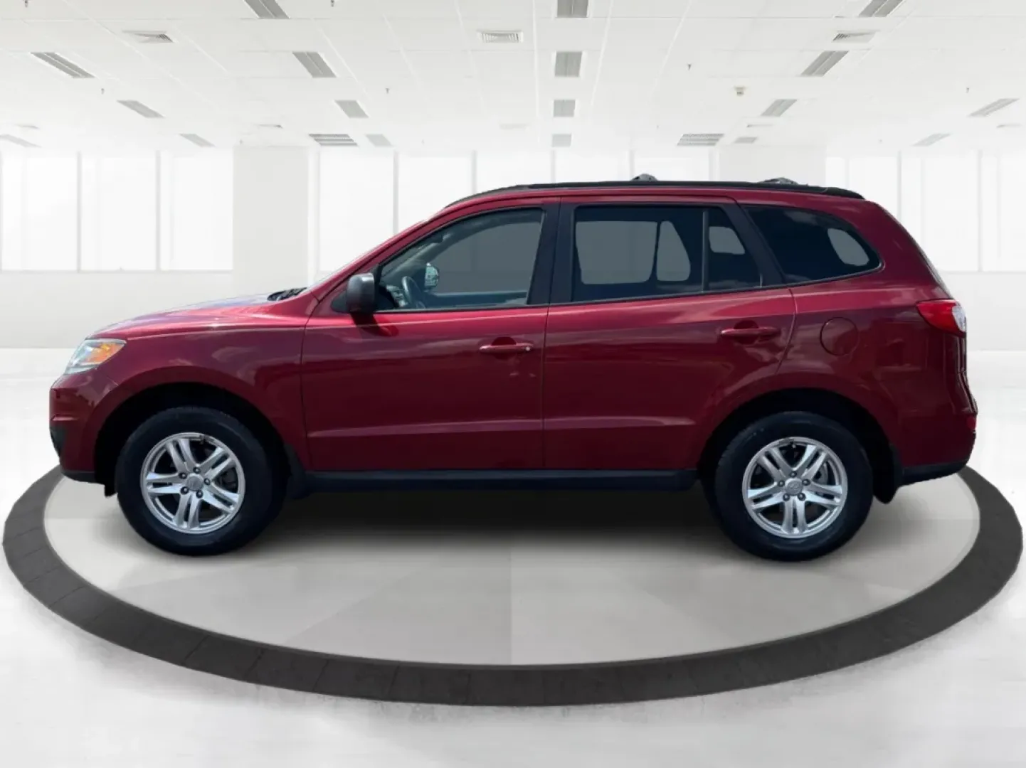 2012 Hyundai Santa Fe GLS (5XYZGDAB0CG) with an 2.4L I-4 DOHC engine, located at 4508 South Dixie Dr, Moraine, OH, 45439, (937) 908-9800, 39.689976, -84.218452 - Embark on your next adventure with the perfect blend of style, comfort, and reliability - the 2012 Hyundai Santa Fe GLS. This versatile SUV is ideal for families, commuters, and weekend warriors alike. Whether you're navigating the bustling streets of Moraine, OH, or exploring nearby attractions lik - Photo#5