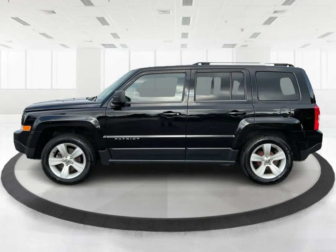 2014 Jeep Patriot Latitude (1C4NJPFA4ED) with an Other engine, located at 880 E. National Road, Vandalia, OH, 45377, (937) 908-9800, 39.891918, -84.183594 - 2014 Jeep Patriot Latitude - Photo#5