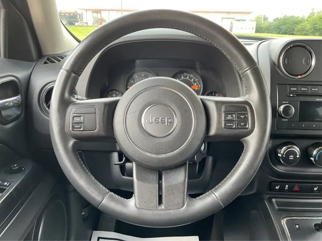 2014 Jeep Patriot Latitude (1C4NJPFA4ED) with an Other engine, located at 880 E. National Road, Vandalia, OH, 45377, (937) 908-9800, 39.891918, -84.183594 - 2014 Jeep Patriot Latitude - Photo#16