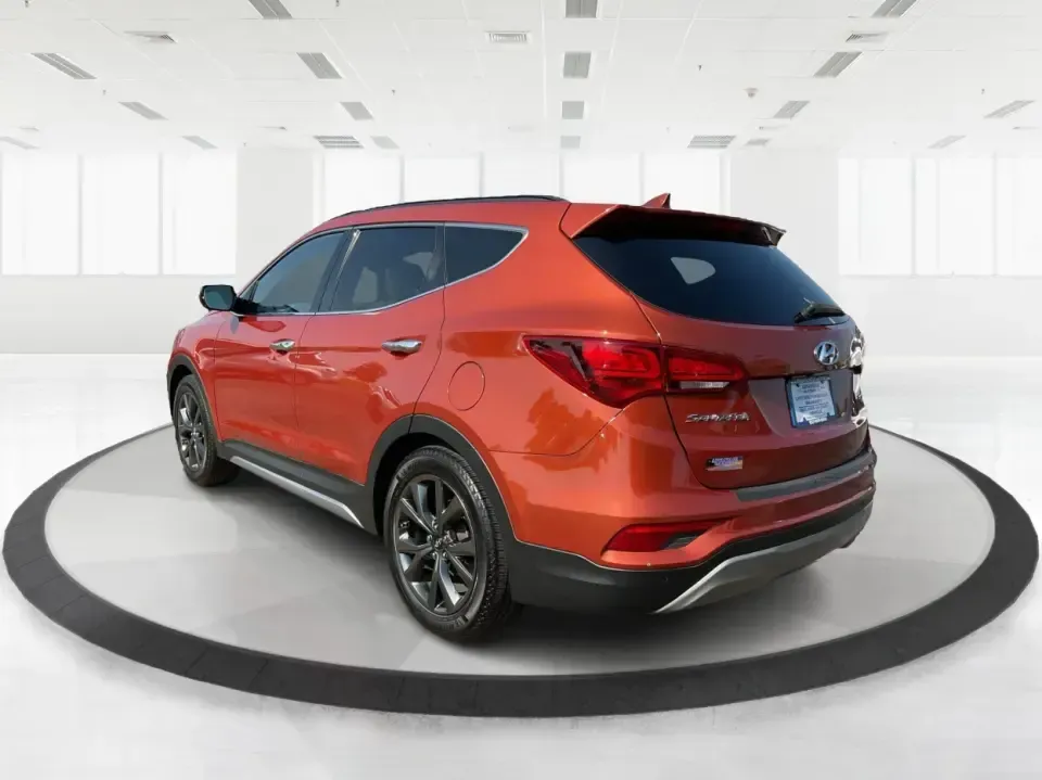 2017 Hyundai Santa Fe 2.0T Ultimate (5XYZW4LA5HG) with an Theta II 2L I-4 gasoline direct injection engine, 6A transmission, located at 880 E. National Road, Vandalia, OH, 45377, (937) 908-9800, 39.891918, -84.183594 - Are you ready to elevate your family adventures or commute comfortably while tackling any road with confidence? Look no further than this 2017 Hyundai Santa Fe 2.0T Ultimate, available now at Advantage Car and Credit in Fairborn, OH. This SUV is not just a vehicle; it's your ticket to creating unfor - Photo#4