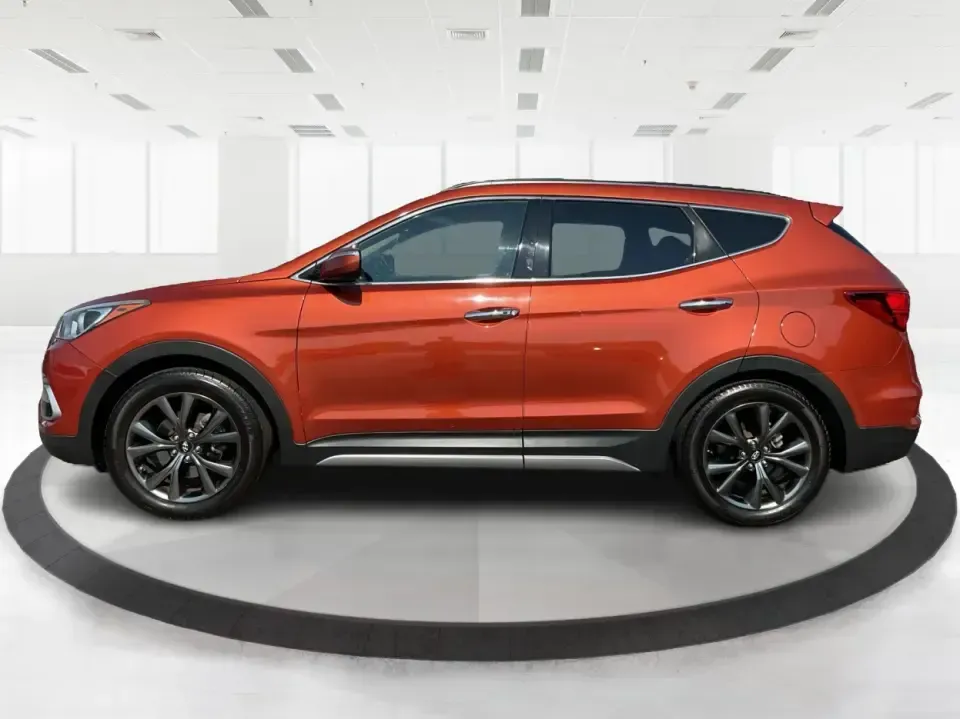 2017 Hyundai Santa Fe 2.0T Ultimate (5XYZW4LA5HG) with an Theta II 2L I-4 gasoline direct injection engine, 6A transmission, located at 880 E. National Road, Vandalia, OH, 45377, (937) 908-9800, 39.891918, -84.183594 - Are you ready to elevate your family adventures or commute comfortably while tackling any road with confidence? Look no further than this 2017 Hyundai Santa Fe 2.0T Ultimate, available now at Advantage Car and Credit in Fairborn, OH. This SUV is not just a vehicle; it's your ticket to creating unfor - Photo#5