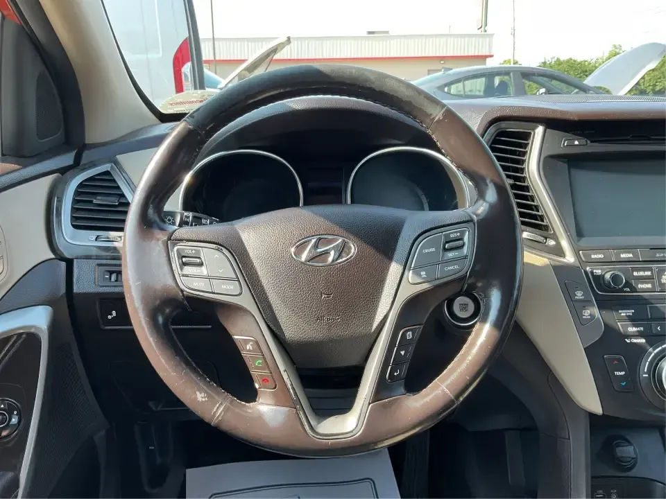 2017 Hyundai Santa Fe 2.0T Ultimate (5XYZW4LA5HG) with an Theta II 2L I-4 gasoline direct injection engine, 6A transmission, located at 880 E. National Road, Vandalia, OH, 45377, (937) 908-9800, 39.891918, -84.183594 - Are you ready to elevate your family adventures or commute comfortably while tackling any road with confidence? Look no further than this 2017 Hyundai Santa Fe 2.0T Ultimate, available now at Advantage Car and Credit in Fairborn, OH. This SUV is not just a vehicle; it's your ticket to creating unfor - Photo#16