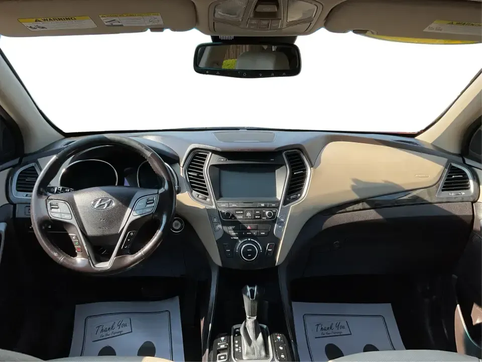 2017 Hyundai Santa Fe 2.0T Ultimate (5XYZW4LA5HG) with an Theta II 2L I-4 gasoline direct injection engine, 6A transmission, located at 880 E. National Road, Vandalia, OH, 45377, (937) 908-9800, 39.891918, -84.183594 - Are you ready to elevate your family adventures or commute comfortably while tackling any road with confidence? Look no further than this 2017 Hyundai Santa Fe 2.0T Ultimate, available now at Advantage Car and Credit in Fairborn, OH. This SUV is not just a vehicle; it's your ticket to creating unfor - Photo#20