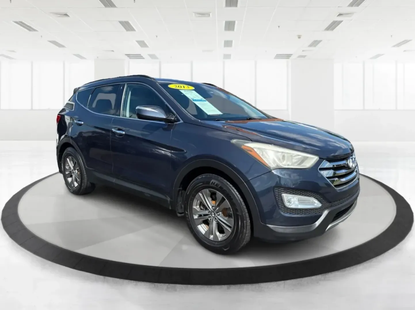 2013 Hyundai Santa Fe Sport (5XYZUDLB4DG) with an Theta II 2.4L I-4 gasoline direct injection engine, located at 401 Woodman Dr, Riverside, OH, 45431, (937) 908-9800, 39.760899, -84.123421 - **Adventure Awaits with the 2013 Hyundai Santa Fe Sport at Advantage Car and Credit Riverside!**<br /> <br /> Are you ready to elevate your family adventures or daily commutes with a perfect blend of style, comfort, and utility? Look no further than this stunning 2013 Hyundai Santa Fe Sport, availa - Photo#0