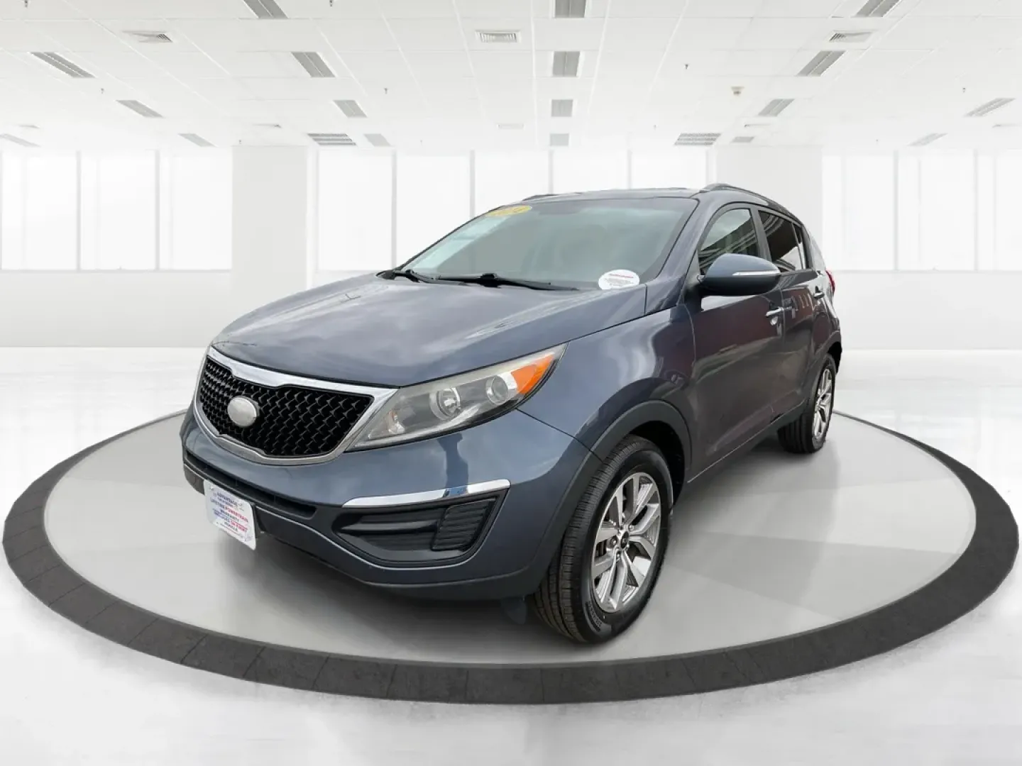 2014 Kia Sportage LX (KNDPBCAC3E7) with an 2.4L I-4 gasoline direct injection engine, located at 8750 N County Rd 25A, Piqua, OH, 45356, (937) 908-9800, 40.164391, -84.232513 - **Adventure Awaits: Explore the 2014 Kia Sportage LX at Advantage Car and Credit!**<br /> <br /> Are you ready to embrace the open road and create unforgettable memories? The 2014 Kia Sportage LX is your ticket to adventure, perfect for weekend getaways, family trips, or daily commuting around Fairb - Photo#8