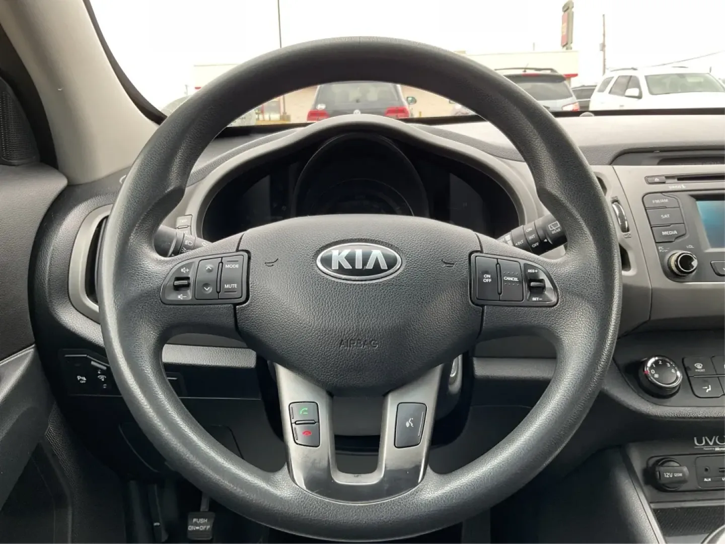 2014 Kia Sportage LX (KNDPBCAC3E7) with an 2.4L I-4 gasoline direct injection engine, located at 8750 N County Rd 25A, Piqua, OH, 45356, (937) 908-9800, 40.164391, -84.232513 - **Adventure Awaits: Explore the 2014 Kia Sportage LX at Advantage Car and Credit!**<br /> <br /> Are you ready to embrace the open road and create unforgettable memories? The 2014 Kia Sportage LX is your ticket to adventure, perfect for weekend getaways, family trips, or daily commuting around Fairb - Photo#16