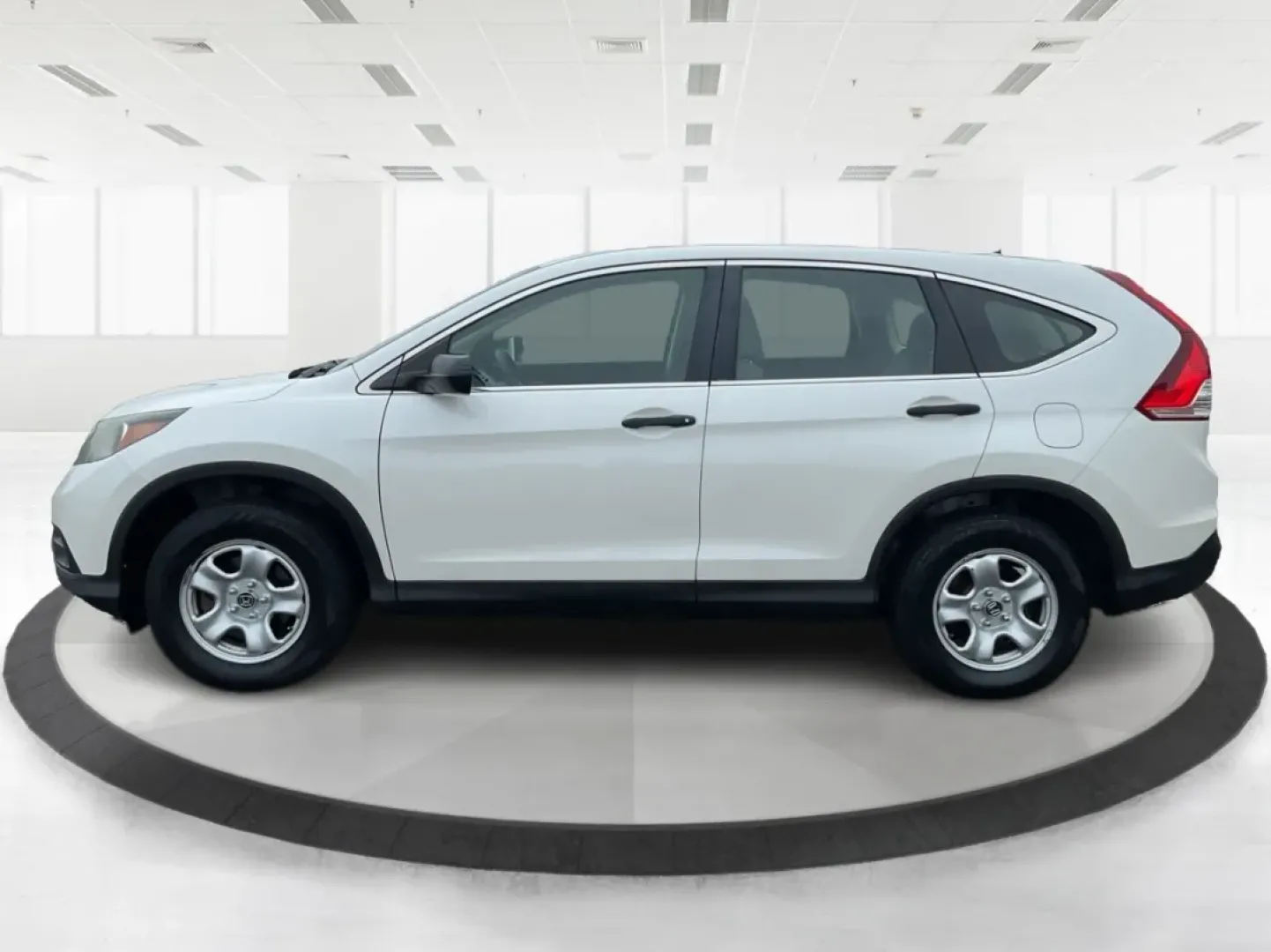 2013 Honda CR-V LX (5J6RM3H37DL) with an 2.4L I-4 DOHC engine, located at 1099 N County Rd 25A , Troy, OH, 45373, (937) 908-9800, 40.057079, -84.212883 - If you're searching for a reliable vehicle that perfectly balances space, comfort, and efficiency for your family or daily commute, look no further than this 2013 Honda CR-V LX, proudly offered by Advantage Car and Credit in Fairborn, OH. Located conveniently at 1184 Kauffman Ave, we specialize in * - Photo#5