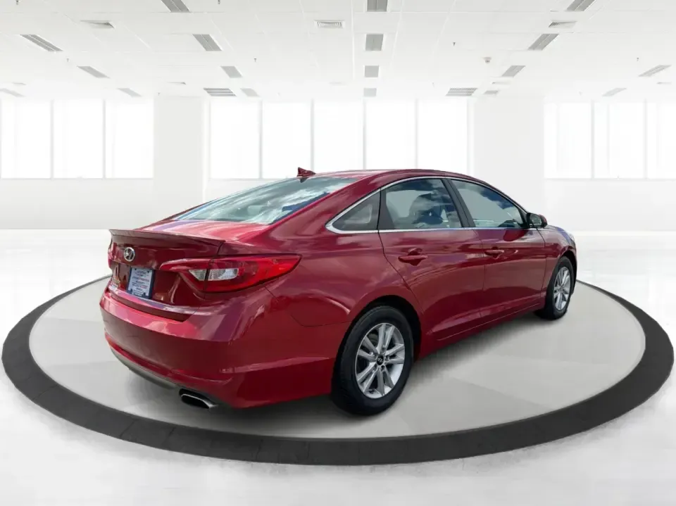2017 Hyundai Sonata SE (5NPE24AF8HH) with an 2.4L L4 DOHC 16V engine, 7A transmission, located at 1099 N County Rd 25A , Troy, OH, 45373, (937) 908-9800, 40.057079, -84.212883 - Need a reliable, comfortable sedan for the daily drive from Troy to Dayton, school drop-offs, or quick weekend getaways to Charleston Falls Preserve? This red 2017 Hyundai Sonata Base is built for real life-easy to park downtown near the Miami County Courthouse, smooth on I75, and efficient enough f - Photo#2