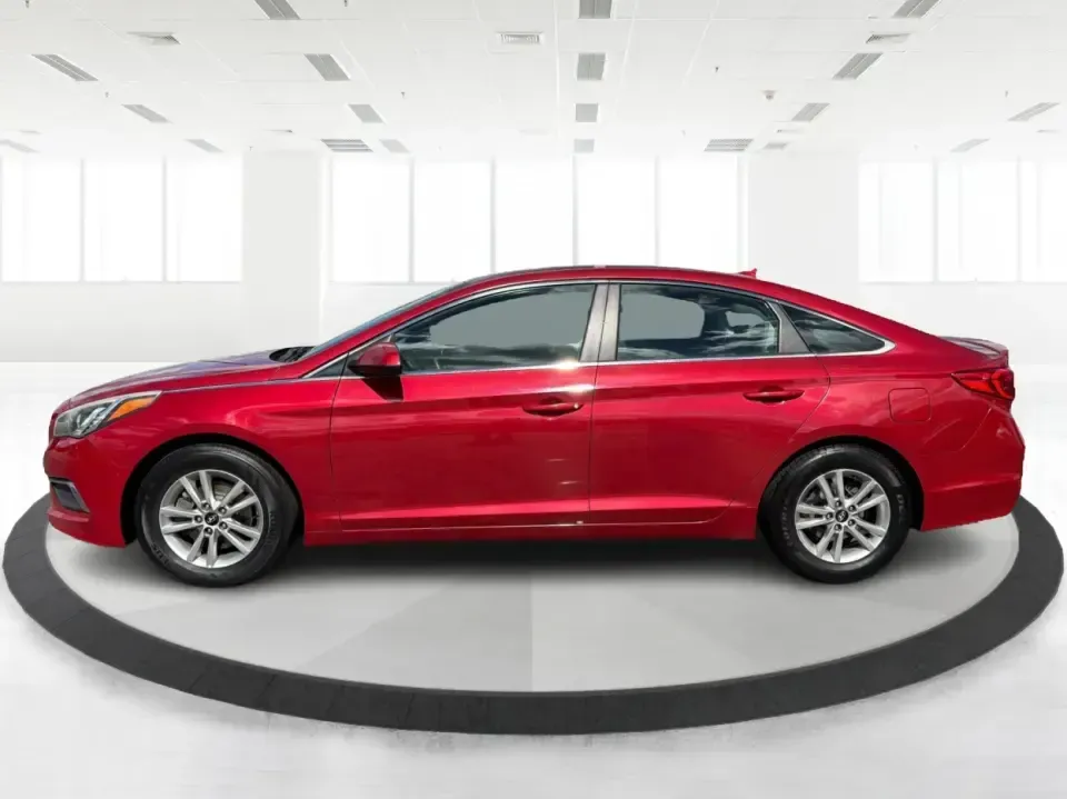 2017 Hyundai Sonata SE (5NPE24AF8HH) with an 2.4L L4 DOHC 16V engine, 7A transmission, located at 1099 N County Rd 25A , Troy, OH, 45373, (937) 908-9800, 40.057079, -84.212883 - Need a reliable, comfortable sedan for the daily drive from Troy to Dayton, school drop-offs, or quick weekend getaways to Charleston Falls Preserve? This red 2017 Hyundai Sonata Base is built for real life-easy to park downtown near the Miami County Courthouse, smooth on I75, and efficient enough f - Photo#5