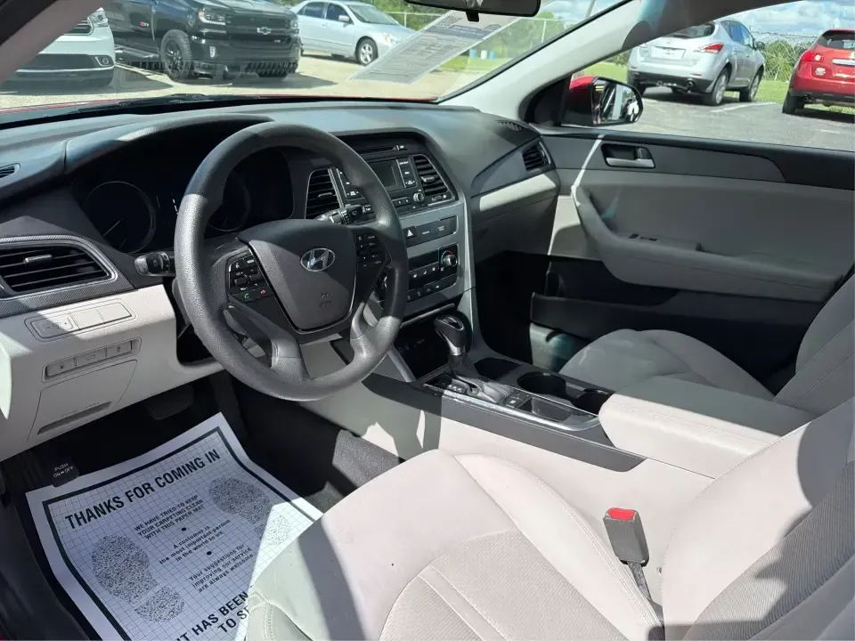 2017 Hyundai Sonata SE (5NPE24AF8HH) with an 2.4L L4 DOHC 16V engine, 7A transmission, located at 1099 N County Rd 25A , Troy, OH, 45373, (937) 908-9800, 40.057079, -84.212883 - Need a reliable, comfortable sedan for the daily drive from Troy to Dayton, school drop-offs, or quick weekend getaways to Charleston Falls Preserve? This red 2017 Hyundai Sonata Base is built for real life-easy to park downtown near the Miami County Courthouse, smooth on I75, and efficient enough f - Photo#9