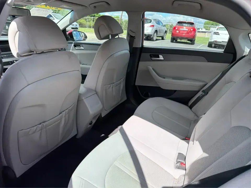 2017 Hyundai Sonata SE (5NPE24AF8HH) with an 2.4L L4 DOHC 16V engine, 7A transmission, located at 1099 N County Rd 25A , Troy, OH, 45373, (937) 908-9800, 40.057079, -84.212883 - Need a reliable, comfortable sedan for the daily drive from Troy to Dayton, school drop-offs, or quick weekend getaways to Charleston Falls Preserve? This red 2017 Hyundai Sonata Base is built for real life-easy to park downtown near the Miami County Courthouse, smooth on I75, and efficient enough f - Photo#10