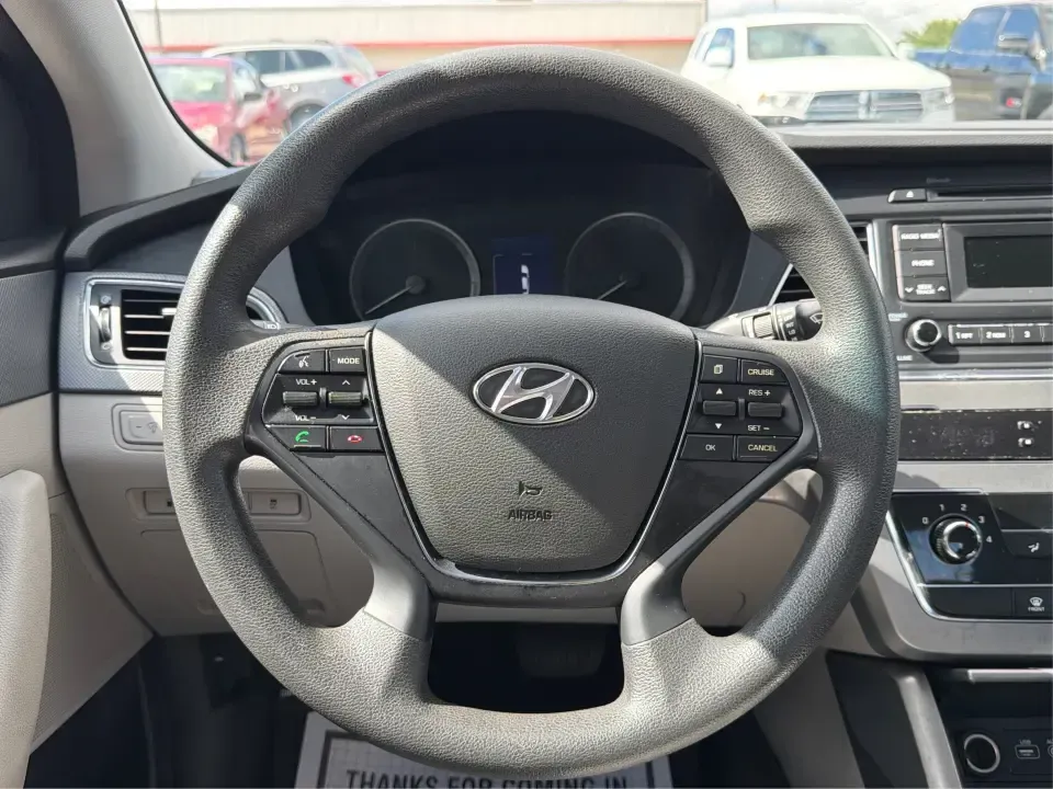 2017 Hyundai Sonata SE (5NPE24AF8HH) with an 2.4L L4 DOHC 16V engine, 7A transmission, located at 1099 N County Rd 25A , Troy, OH, 45373, (937) 908-9800, 40.057079, -84.212883 - Need a reliable, comfortable sedan for the daily drive from Troy to Dayton, school drop-offs, or quick weekend getaways to Charleston Falls Preserve? This red 2017 Hyundai Sonata Base is built for real life-easy to park downtown near the Miami County Courthouse, smooth on I75, and efficient enough f - Photo#16