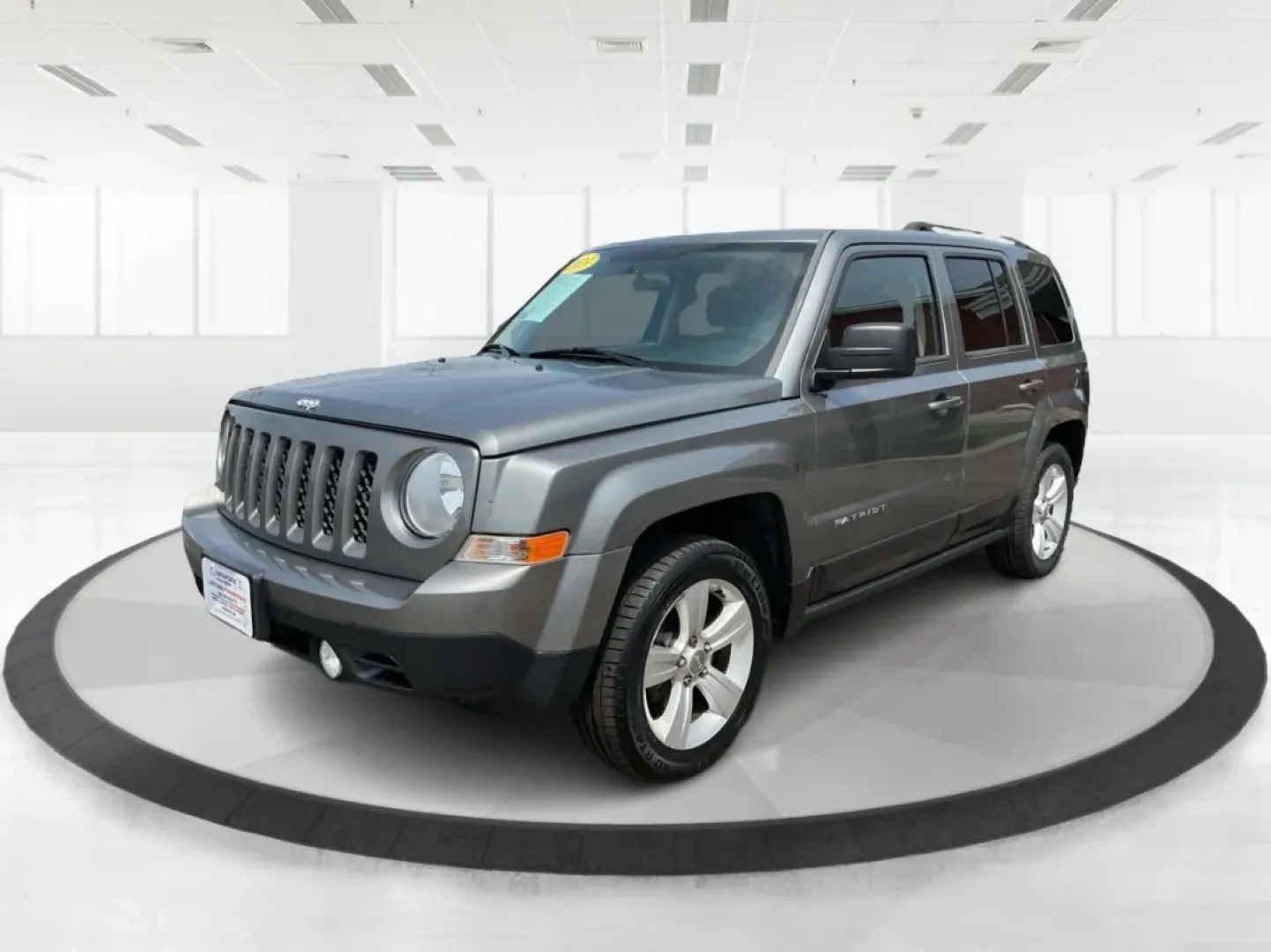 2013 Jeep Patriot Latitude (1C4NJPFA8DD) with an Other engine, located at 1951 S Dayton Lakeview Rd., New Carlisle, OH, 45344, (937) 908-9800, 39.890999, -84.050255 - Ready to elevate your adventures? Meet the 2013 Jeep Patriot Latitude, a versatile SUV that perfectly balances rugged capability with everyday comfort. Whether you're navigating the bustling streets of Fairborn, OH, or heading out for a weekend getaway to the scenic parks nearby, this vehicle is des - Photo#8