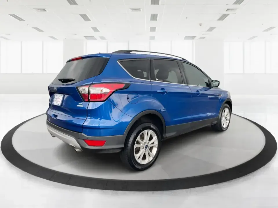 2017 Ford Escape SE (1FMCU0GD5HU) with an 1.5L L4 DOHC 16V engine, 6A transmission, located at 1951 S Dayton Lakeview Rd., New Carlisle, OH, 45344, (937) 908-9800, 39.890999, -84.050255 - **Adventure Awaits in This 2017 Ford Escape SE Perfect for Your Ohio Lifestyle!**<br /> <br /> Are you ready to embrace the open road? Whether you're commuting to work, taking the kids to soccer practice, or planning a weekend getaway to nearby attractions like the National Museum of the U.S. Air F - Photo#2