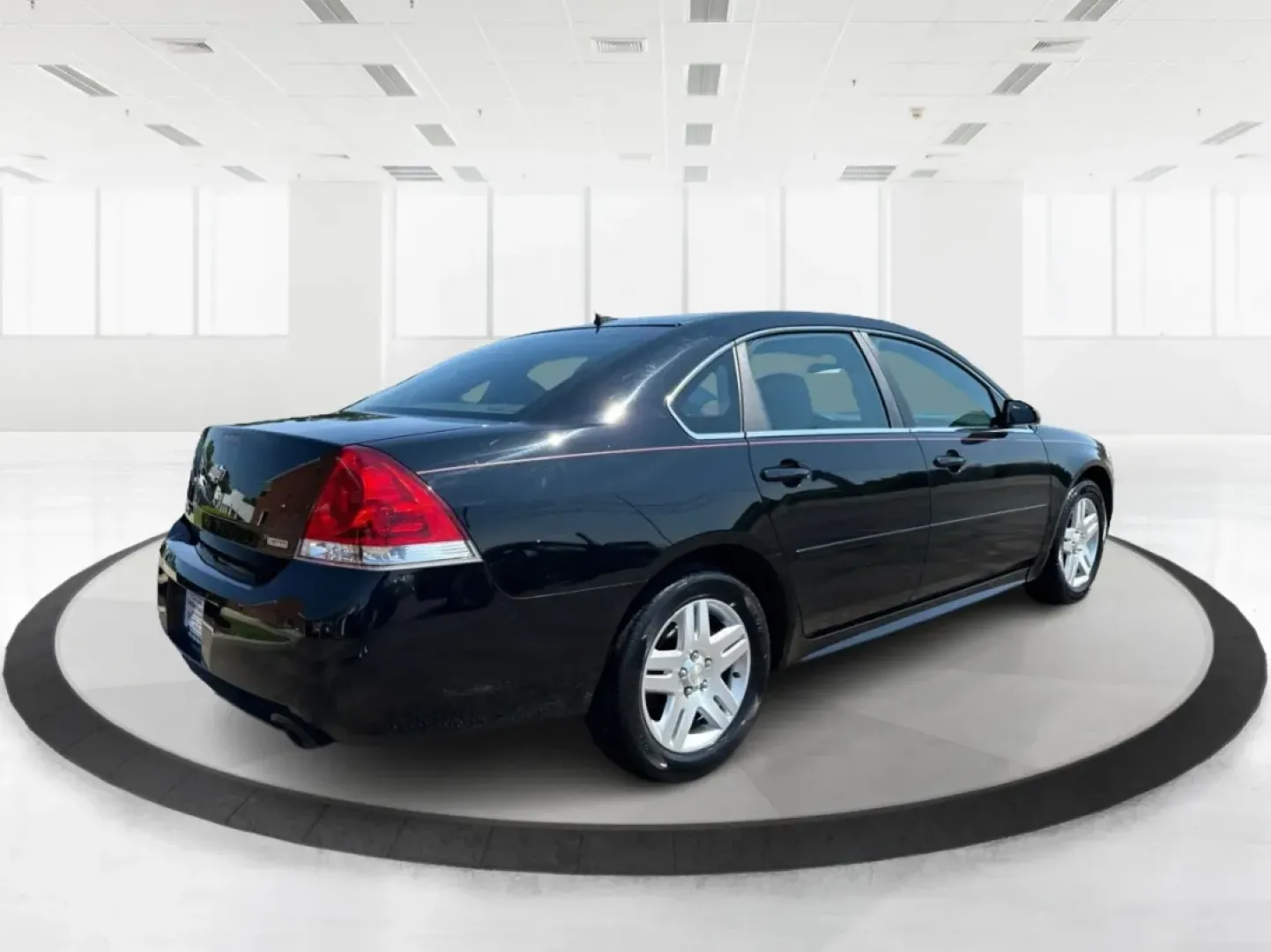 2014 Chevrolet Impala Limited LT (2G1WB5E3XE1) with an 3.6L V-6 gasoline direct injection engine, located at 8750 N County Rd 25A, Piqua, OH, 45356, (937) 908-9800, 40.164391, -84.232513 - Are you ready for your next adventure, whether it's a family road trip, a daily commute, or simply running errands around Fairborn? The 2014 Chevrolet Impala Limited LT is the perfect sedan to elevate your driving experience. With its stylish black exterior and reliable performance, this vehicle is - Photo#2