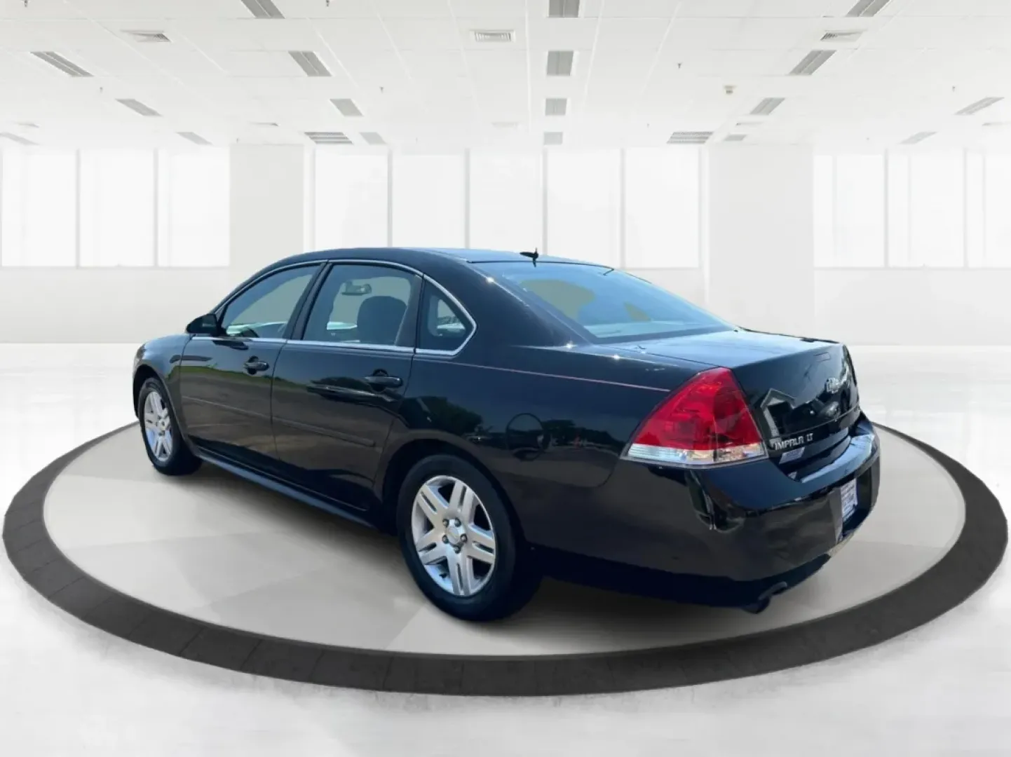 2014 Chevrolet Impala Limited LT (2G1WB5E3XE1) with an 3.6L V-6 gasoline direct injection engine, 6-Speed Automatic transmission, located at 1230 East Main St, Xenia, OH, 45385, (937) 908-9800, 39.688026, -83.910172 - Are you ready for your next adventure, whether it's a family road trip, a daily commute, or simply running errands around Fairborn? The 2014 Chevrolet Impala Limited LT is the perfect sedan to elevate your driving experience. With its stylish black exterior and reliable performance, this vehicle is - Photo#4