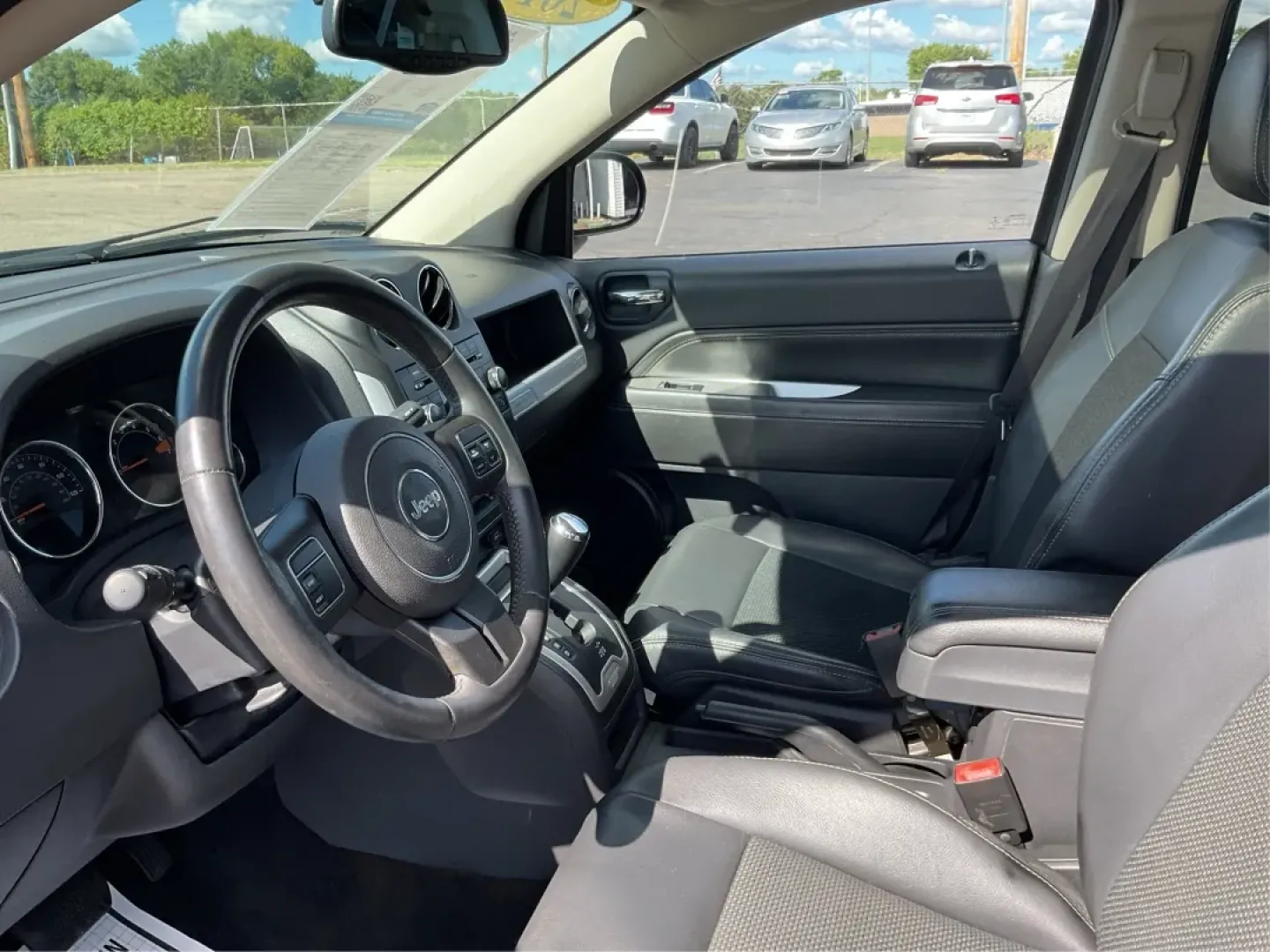 2014 Jeep Compass Latitude 4WD (1C4NJDEB8ED) with an 2.4L L4 DOHC 16V engine, Continuously Variable Transmission transmission, located at 880 E. National Road, Vandalia, OH, 45377, (937) 908-9800, 39.891918, -84.183594 - **Unleash Your Adventurous Spirit with the 2014 Jeep Compass Latitude 4WD!** <br /> <br /> Are you ready to elevate your weekend getaways or daily commutes? Look no further than the stunning 2014 Jeep Compass Latitude 4WD available at Advantage Car and Credit in Vandalia, OH! This rugged yet stylish - Photo#9