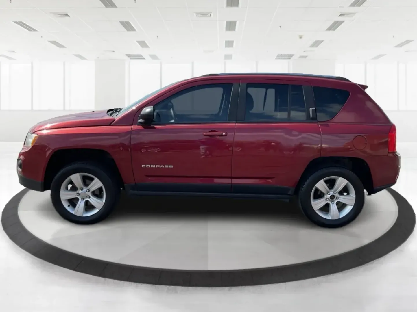 2013 Jeep Compass Latitude (1C4NJDEB6DD) with an 2.4L I-4 DOHC engine, located at 1099 N County Rd 25A , Troy, OH, 45373, (937) 908-9800, 40.057079, -84.212883 - Are you ready to elevate your adventures and embrace a lifestyle filled with exploration? The 2013 Jeep Compass Latitude is the perfect companion for those who value versatility and comfort, making it an ideal choice for weekend getaways or daily commutes. This rugged yet refined SUV is now availabl - Photo#4