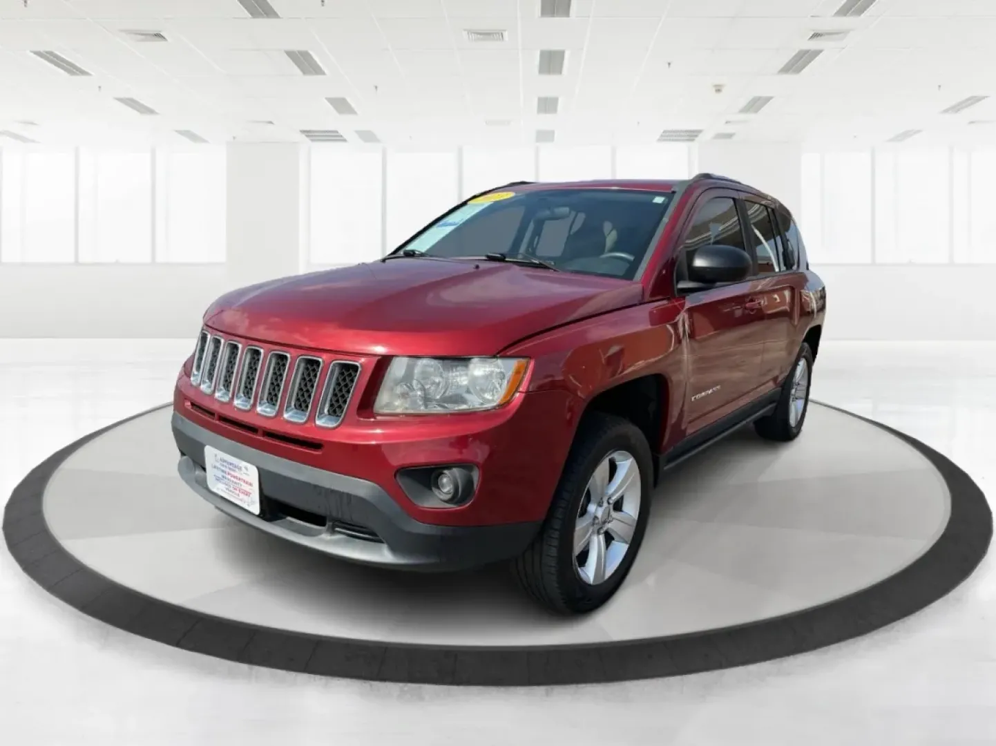 2013 Jeep Compass Latitude (1C4NJDEB6DD) with an 2.4L I-4 DOHC engine, located at 401 Woodman Dr, Riverside, OH, 45431, (937) 908-9800, 39.760899, -84.123421 - Are you ready to elevate your adventures and embrace a lifestyle filled with exploration? The 2013 Jeep Compass Latitude is the perfect companion for those who value versatility and comfort, making it an ideal choice for weekend getaways or daily commutes. This rugged yet refined SUV is now availabl - Photo#7
