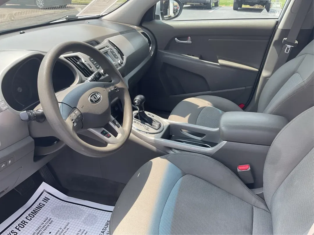 2016 Kia Sportage LX (KNDPBCACXG7) with an Theta II 2.4L I-4 gasoline direct injection engine, 6-Speed Automatic transmission, located at 401 Woodman Dr, Riverside, OH, 45431, (937) 908-9800, 39.760899, -84.123421 - Embrace the journey of life with the 2016 Kia Sportage LX, a vehicle designed for those who thrive on adventure and seek comfort in their daily commute. Whether you're navigating the bustling streets of Fairborn, OH, or embarking on a weekend family getaway, this versatile crossover is your perfect - Photo#9