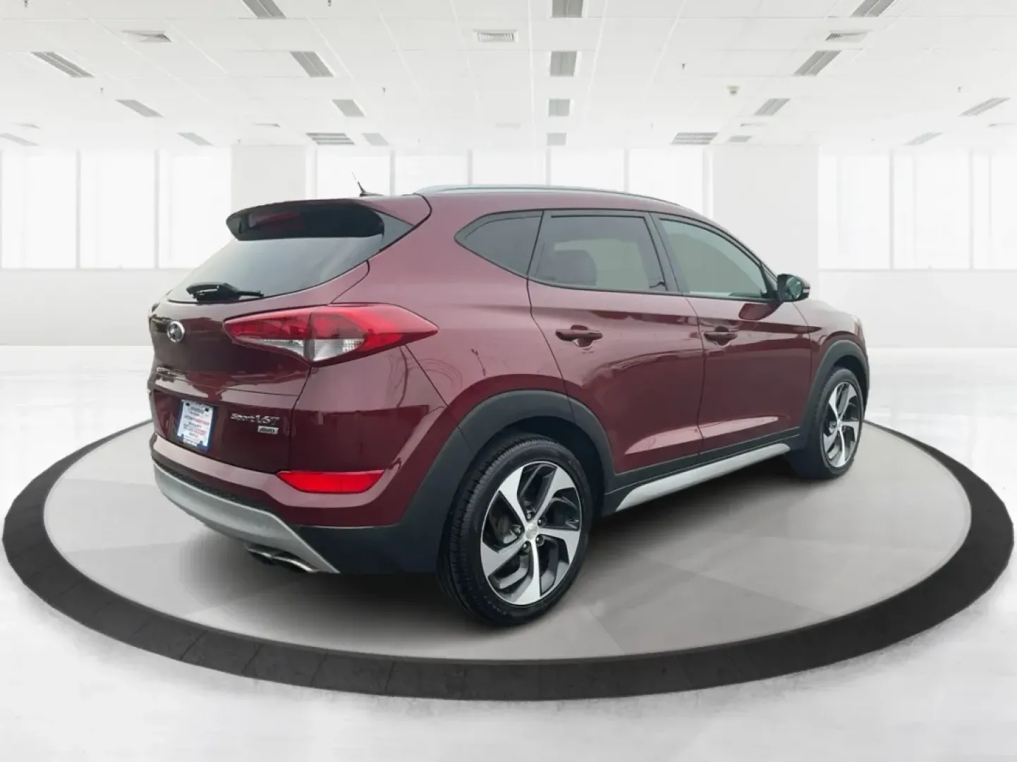 2017 Hyundai Tucson Sport (KM8J3CA29HU) with an 1.6L I-4 gasoline direct injection engine, located at 1099 N County Rd 25A , Troy, OH, 45373, (937) 908-9800, 40.057079, -84.212883 - **Discover Adventure in the 2017 Hyundai Tucson: Your Ideal SUV for Every Journey!**<br /> <br /> Are you ready to elevate your driving experience? The 2017 Hyundai Tucson in striking Ruby Wine is here, tailored for those who crave versatility and reliability in their daily adventures. Whether you'r - Photo#2